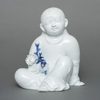KAKIEMON’WARE PORCELAIN FIGURE OF A CHILD, SHOWA PERIOD (1926-1989)