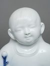 KAKIEMON’WARE PORCELAIN FIGURE OF A CHILD, SHOWA PERIOD (1926-1989)