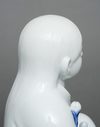 KAKIEMON’WARE PORCELAIN FIGURE OF A CHILD, SHOWA PERIOD (1926-1989)