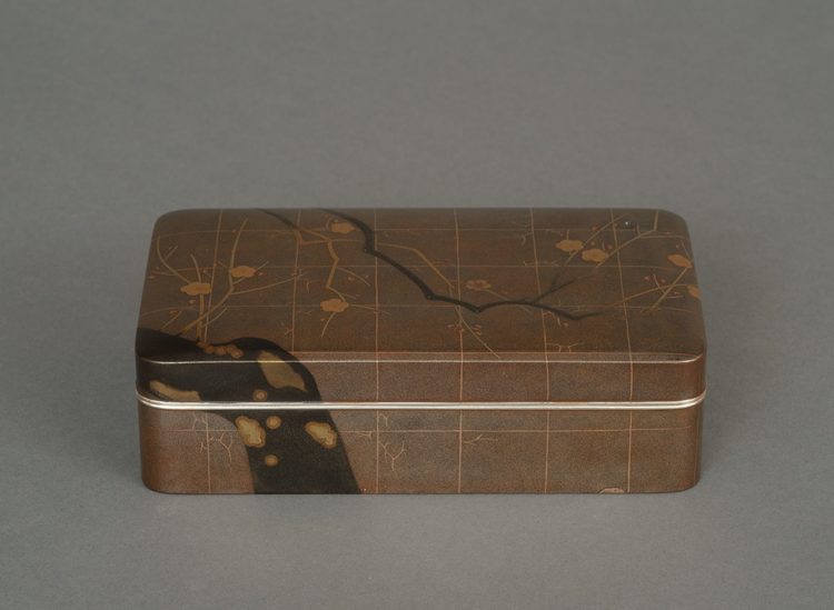 A SILVER JAPANESE TEBAKO 手箱 (PERSONAL ACCESSORIES BOX) WITH APRICOT TREE, EARLY SHOWA PERIOD