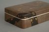 A SILVER JAPANESE TEBAKO 手箱 (PERSONAL ACCESSORIES BOX) WITH APRICOT TREE, EARLY SHOWA PERIOD