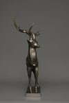 A JAPANESE LARGE BRONZE MUSCULAR STAG, TAISHO PERIOD (1912-1926)