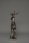 A JAPANESE LARGE BRONZE MUSCULAR STAG, TAISHO PERIOD (1912-1926)