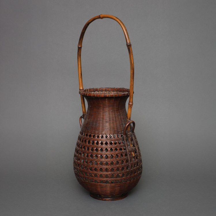 A JAPANESE IKEBANA BASKET BY CHIKUBOSAI II, LATE 20TH CENTURY