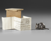 MINIATURE OKIMONO OF A SILVER MOUSE — IN ORIGINAL BOX WITH MAKER’S LEAFLET, 20TH CENTURY