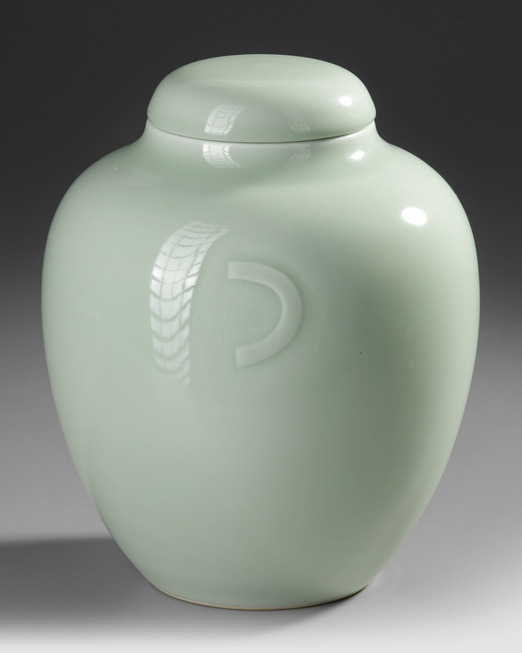 A CHINESE CELADON-GLAZED JAR AND COVER
