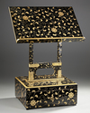 JAPANESE LACQUERED READING TABLE IN THREE PARTS WITH FLORAL DECORATION,MEIJI PERIOD,1868-1912