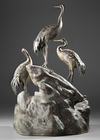 A JAPANESE BRONZE OKIMONO, CRANES AND TURTLES IN HARMONY,MEIJI PERIOD,1868-1912