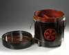 A CIRCULAR JAPANESE BENTO FOOD CONTAINER, EDO PERIOD, CIRCA 1800