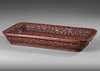 A CHINESE RED LACQUERED TRAY WITH DOUBLE DRAGON AND BUDDHIST FLAME MOTIF, 20TH CENTURY