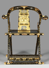 A BLACK LACQUERED JAPANESE FOLDABLE TEMPLE CHAIR WITH FLORAL MOTIFS,MEIJI PERIOD,1868-1912