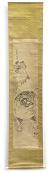 A JAPANESE SCROLL PAINTING OF A TIGER FEROCIOUSLY APPROACHING — SIGNED AND MOUNTED WITH GOLD BROCADE