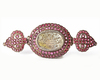 A MUGHAL RUBY-SET BAZUBAND WITH INSCRIBED MOTHER-OF-PEARL , INDIA 19TH CENTURY