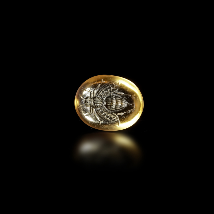 A CITRINE INTAGLIO OF A FLYING BEE EARLY ROMAN, 1ST CENTURY B.C. – 1ST CENTURY A.D.