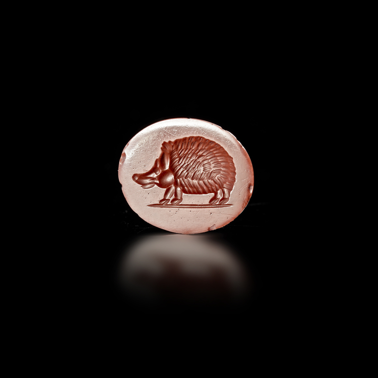 RED JASPER INTAGLIO OF A HEDGEHOG ROMAN, 1ST CENTURY A.D.