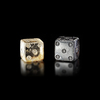 TWO CUBIC DICE: BLACK STONE, ROCK CRYSTAL, EAST PERSIA,  9TH–12TH CENTURY
