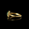BYZANTINE GOLD RING WITH GREEN BERYL INSET OF A PEACOCK 5TH–7TH CENTURY A.D.