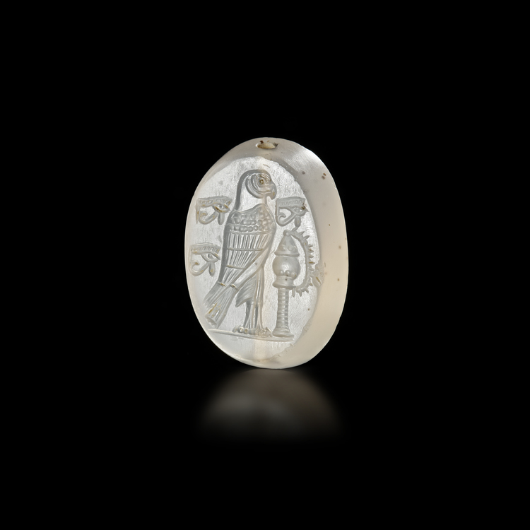A GRECO-PERSIAN CHALCEDONY SCARABOID WITH STANDING VULTURE AND CENSER – 5TH TO 4TH CENTURY B.C.