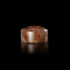 AN EASTERN GREEK BANDED AGATE SCARABOID OF A WALKING LION – 5TH TO 4TH CENTURY B.C.