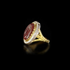 A ROMAN PORTRAIT INTAGLIO OF 'AELIUS' 2ND CENTURY AD, MOUNTED IN A 20 CENTURY GOLD RING, 18K WITH DIAMOND