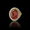 A ROMAN PORTRAIT INTAGLIO OF 'AELIUS' 2ND CENTURY AD, MOUNTED IN A 20 CENTURY GOLD RING, 18K WITH DIAMOND