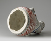 A JAPANESE FIGURE OF A BOY ON DRUM,1670-1690