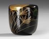 A NATSUME TEACADDY, FINELY LACQUERED WITH A LARGE RISING SUN SHINING THROUGH BRANCHES AND LEAVES, 20TH CENTURY