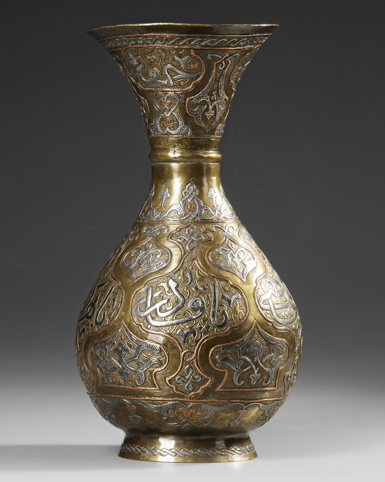 A SILVER AND COPPER INLAID BRASS CAIROWORK VASE, EGYPT OR SYRIA 19TH CENTURY