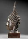A BRONZE HEAD OF BUDDHA, THAILAND 19TH CENTURY