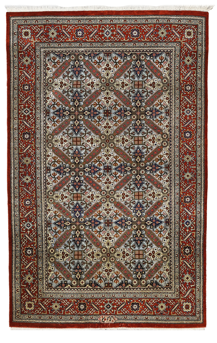 A SIGNED ANATOLIAN SILK CARPET