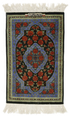 A PERSIAN SILK CARPET, SIGNED