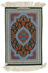 A PERSIAN SILK CARPET, SIGNED