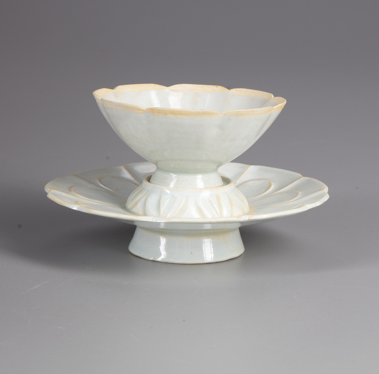 A CHINESE 'QINGBAI' CUP AND STAND, SONG DYNASTY (960-1279 AD)