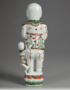A CHINESE  FAMILLE VERTE FIGURE OF A BOY, KANGXI PERIOD (1661-1722)