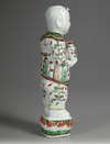 A CHINESE  FAMILLE VERTE FIGURE OF A BOY, KANGXI PERIOD (1661-1722)