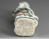 A CHINESE  FAMILLE VERTE FIGURE OF A BOY, KANGXI PERIOD (1661-1722)
