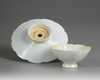 A CHINESE 'QINGBAI' CUP AND STAND, SONG DYNASTY (960-1279 AD)