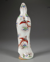 A JAPANESE GREEN ENAMELLED PORCELAIN FIGURE OF A LADY, 19TH CENTURY