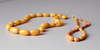 TWO AMBER NECKLACES