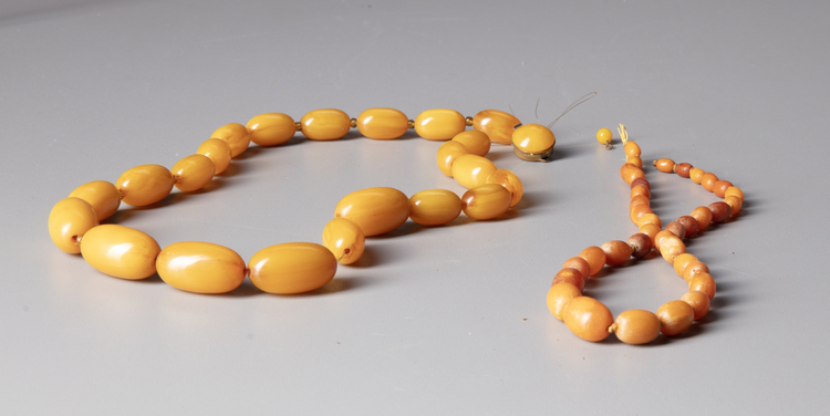 TWO AMBER NECKLACES