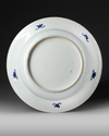 A LARGE CHINESE BLUE AND WHITE PEACOCK CHARGER, KANGXI PERIOD (1662-1722)