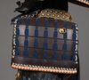 EXCEPTIONAL SET OF 2 EDO-PERIOD SUITS-OF-ARMOUR (YOROI), COMPLETE WITH 2 MATCHING FOLDING SCREENS (BYÔBU)