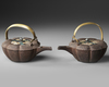 A SET OF TWO IRON SAKÉ KETTLES  JAPANESE, MEIJI TO TAISHŌ PERIOD (LATE 19TH – EARLY 20TH CENTURY)