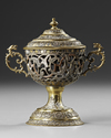 ISLAMIC BRONZE AND SILVER INCENSE BURNER, 19TH CENTURY