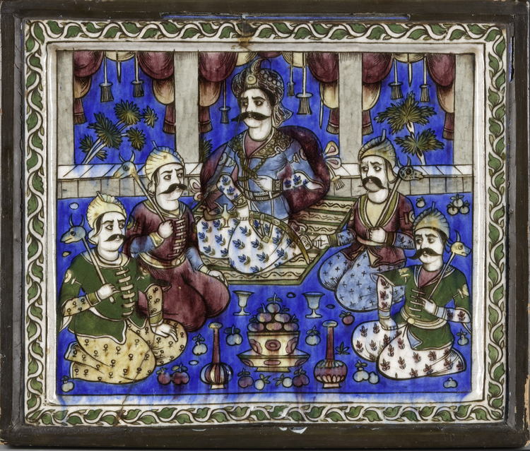 A QAJAR 'SHAH ABBAS' MOULDED POTTERY TILE, PERSIA, 19TH CENTURY