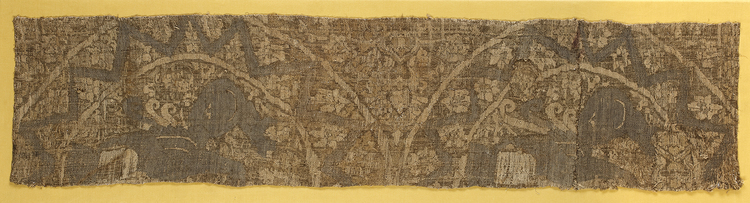 A RARE SELJUK WOVEN METAL THREAD BROCADE PANEL DEPICTING SPHINXES,  PERSIA, 11TH-12TH CENTURY