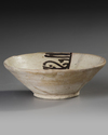 A NISHAPUR POTTERY BOWL, PERSIA 10TH CENTURY
