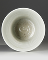 A CHINESE TRANSITIONAL STYLE BLUE AND WHITE BEAKER GU VASE
