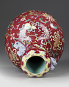 A CHINESE FAMILLE ROSE RUBY GROUND VASE, 19TH/20TH CENTURY