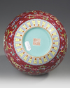 A CHINESE FAMILLE ROSE RUBY GROUND VASE, 19TH/20TH CENTURY